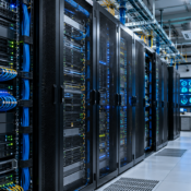Server room management with organized server racks and monitoring systems
